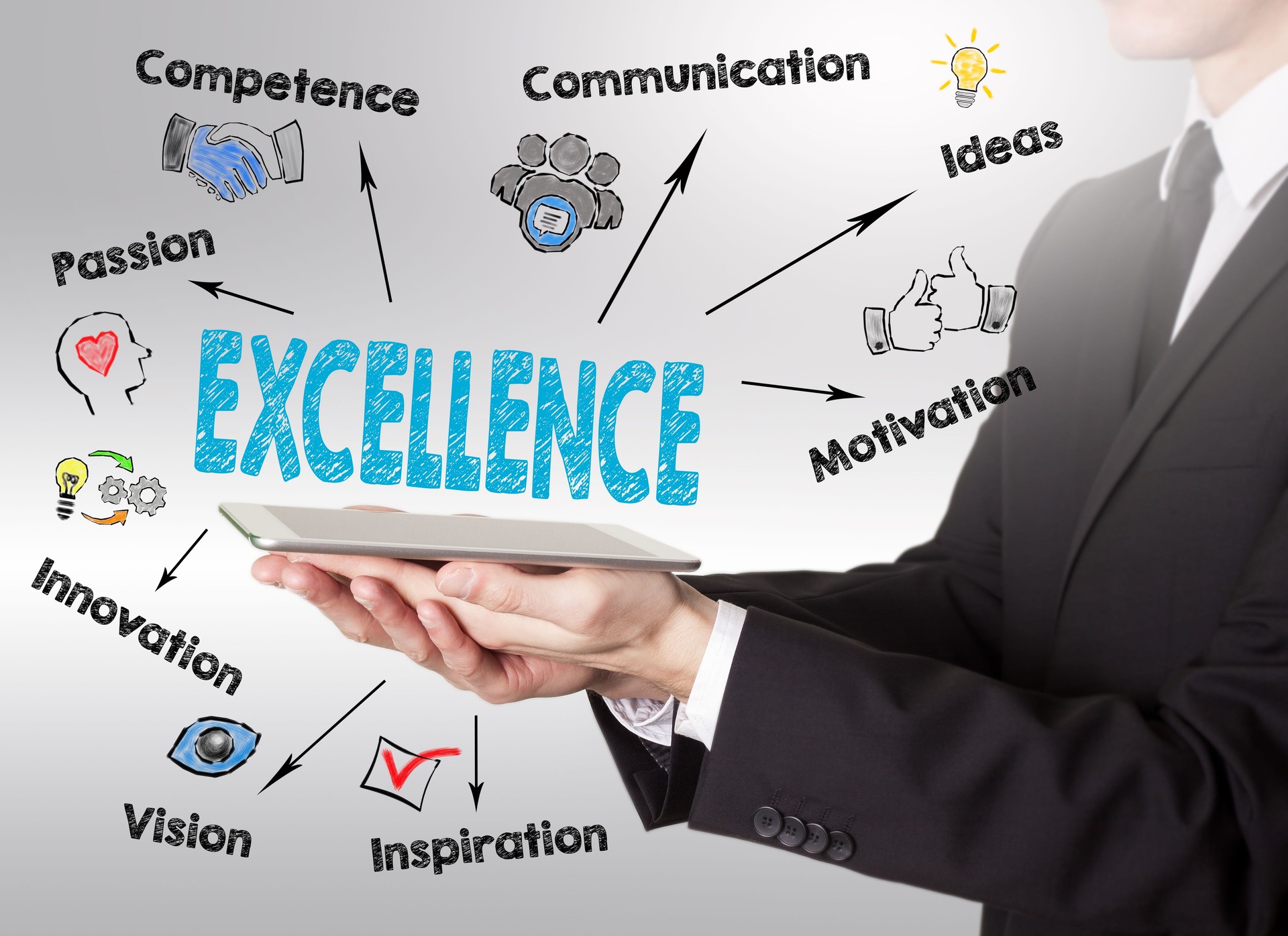 Excellence concept, young man holding a tablet computer